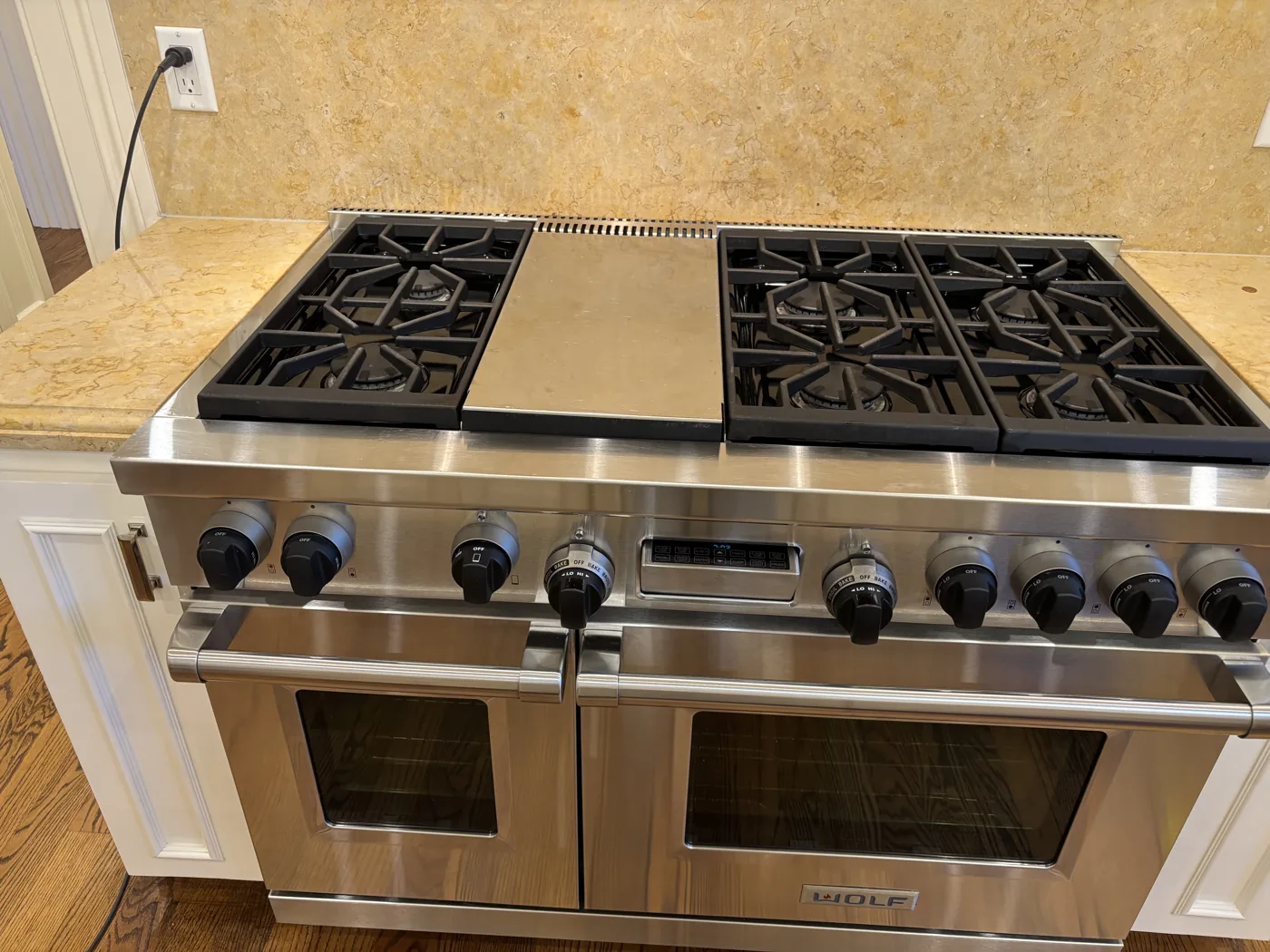 Stainless range and double oven cleaned down to the burner grates