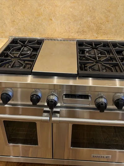 Stainless range and double oven cleaned down to the burner grates